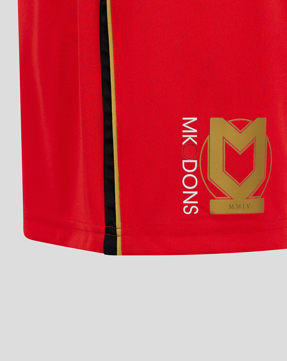 Red shorts with black and gold side stripe featuring a gold Mk Dons crest and vertical MK DONS text