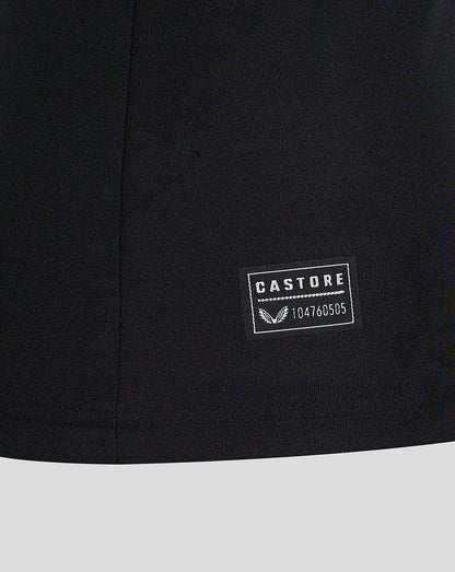 Close-up of black Preston Women's 24/25 Third Shirt fabric with Castore patch near hem.
