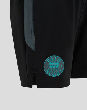 Close up of Bath Rugby Shorts showing teal side panel and Bath crest badge near the hem.