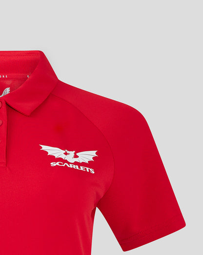 Close-up of red Scarlets polo showing white Scarlets crest on the chest