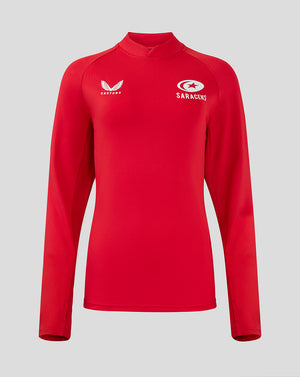 Red women's training top with Saracens crest and Castore logo on chest