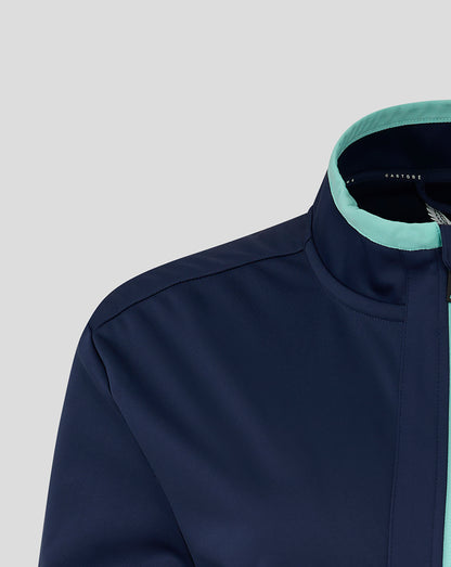 Shoulder and collar area of navy Everton travel jacket with mint green collar trim.