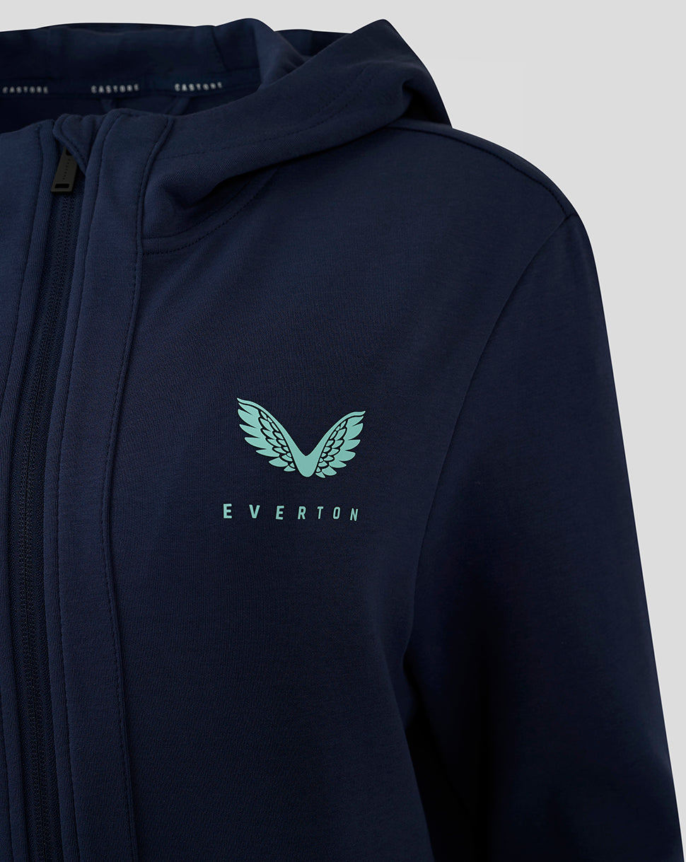 Navy jacket chest displays turquoise wing logo and EVERTON text embroidery.