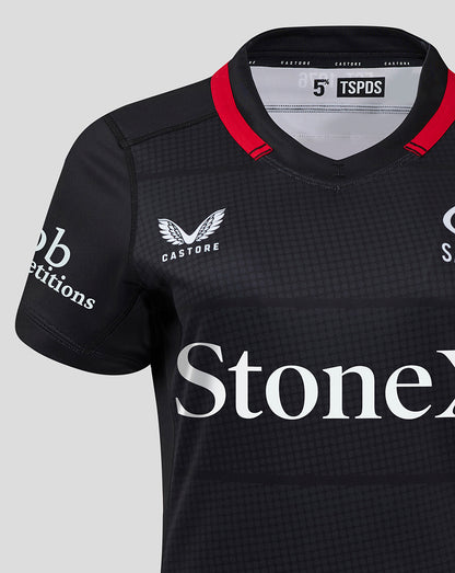 Close up of the chest area showing Castore logo and StoneX sponsor on the Saracens home shirt