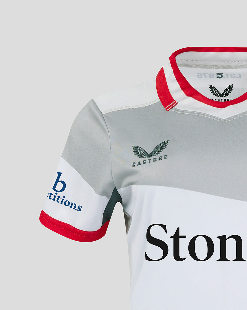 Close up of Saracens women's away shirt with grey panels white shoulders red collar trim and Stonex sponsor across the chest