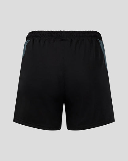 Back view of Preston women's black training shorts with elastic waistband and blue side panels.