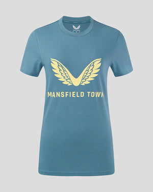 Light blue Mansfield Town women's training tee with pale yellow wing logo and text on the chest
