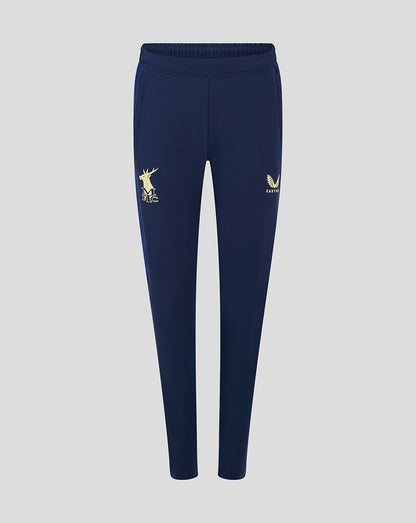 Front view of navy Mansfield women's training pants featuring a gold deer MFC logo on the left thigh and a gold winged crest on the right thigh.