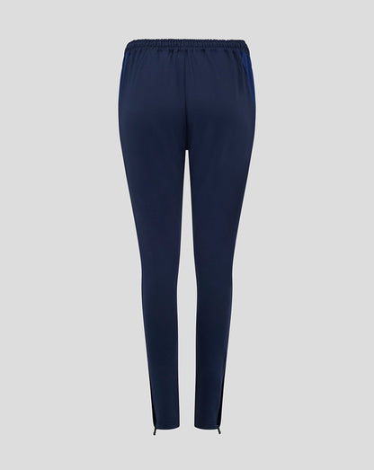 Back view of navy Preston NE training pants with zipped ankles, crest on left thigh and Castore logo on right thigh
