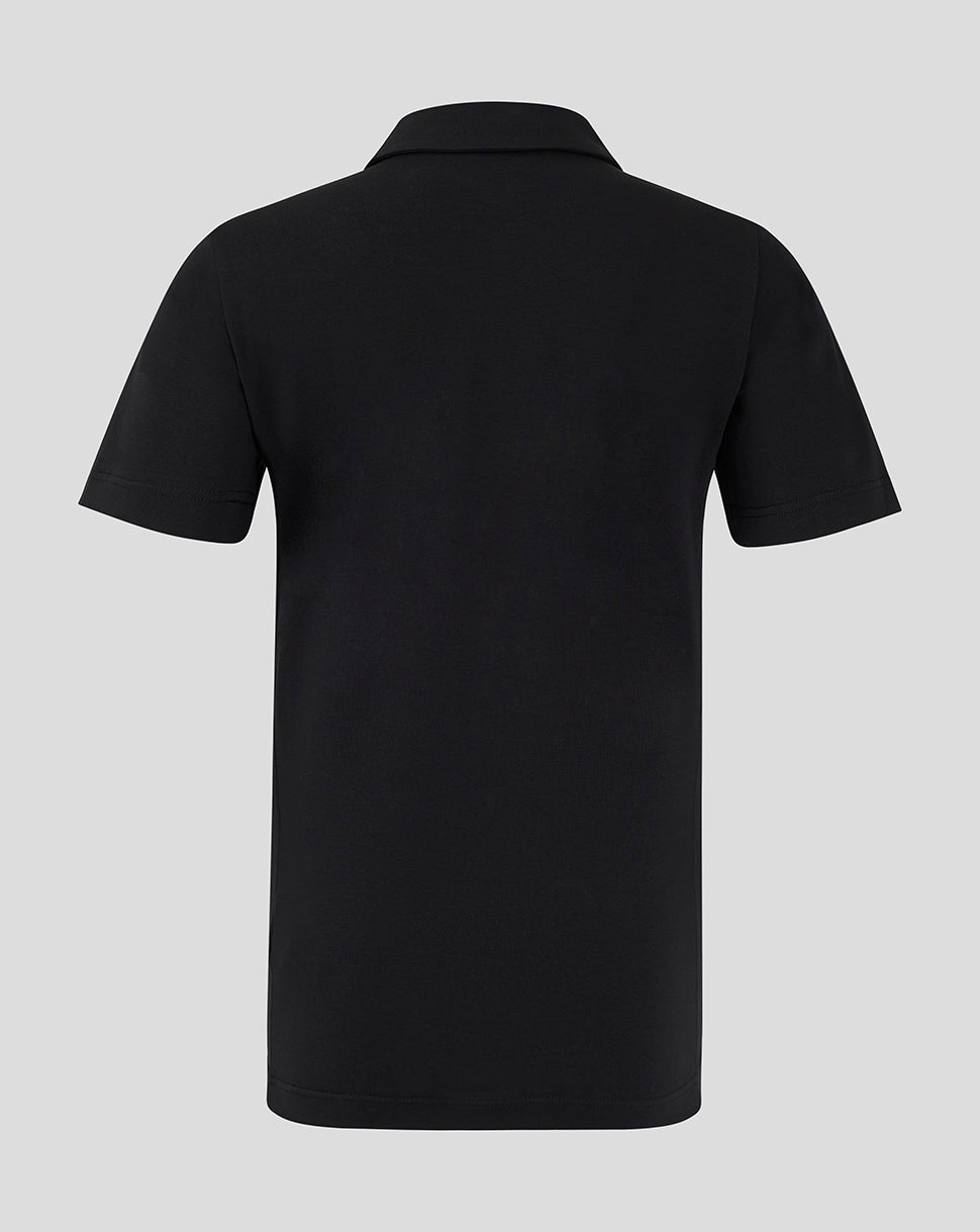 Back view of black Mansfield Travel Polo showing clean silhouette and short sleeves.