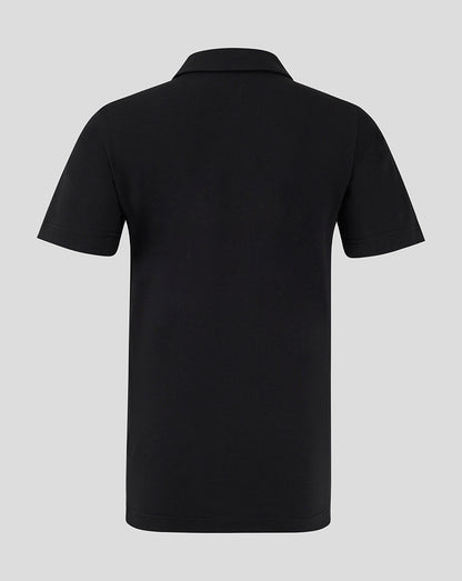 Back view of black Mansfield Travel Polo showing clean silhouette and short sleeves.