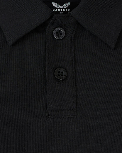 Close-up of black polo collar with button placket and Castore label at the neckline