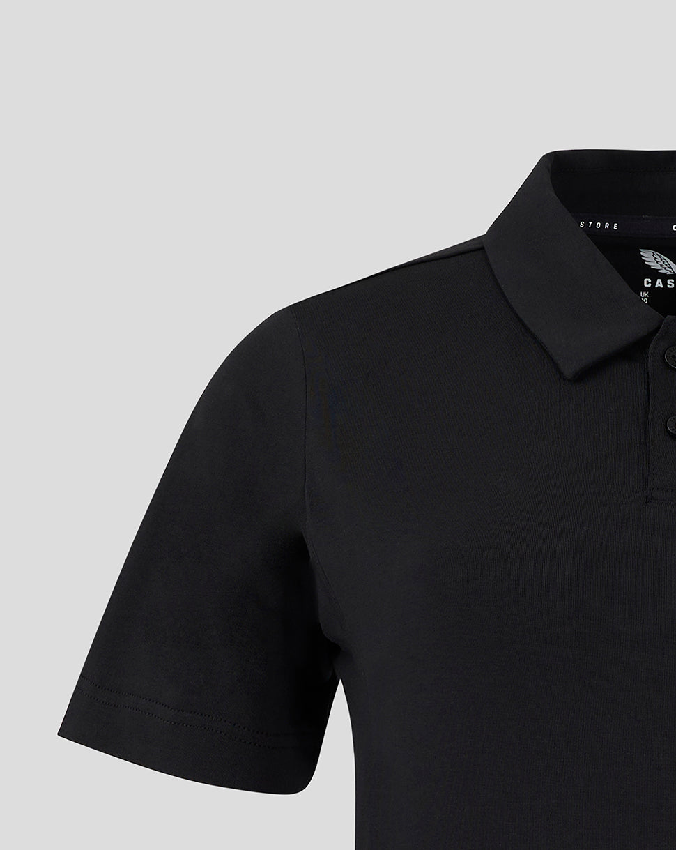 Close-up of collar and button placket on a black Mansfield Travel Polo.
