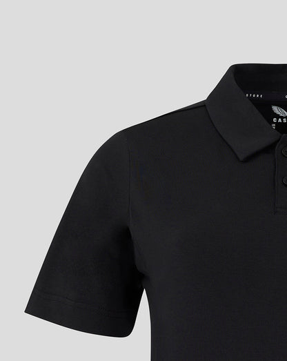 Close-up of collar and button placket on a black Mansfield Travel Polo.