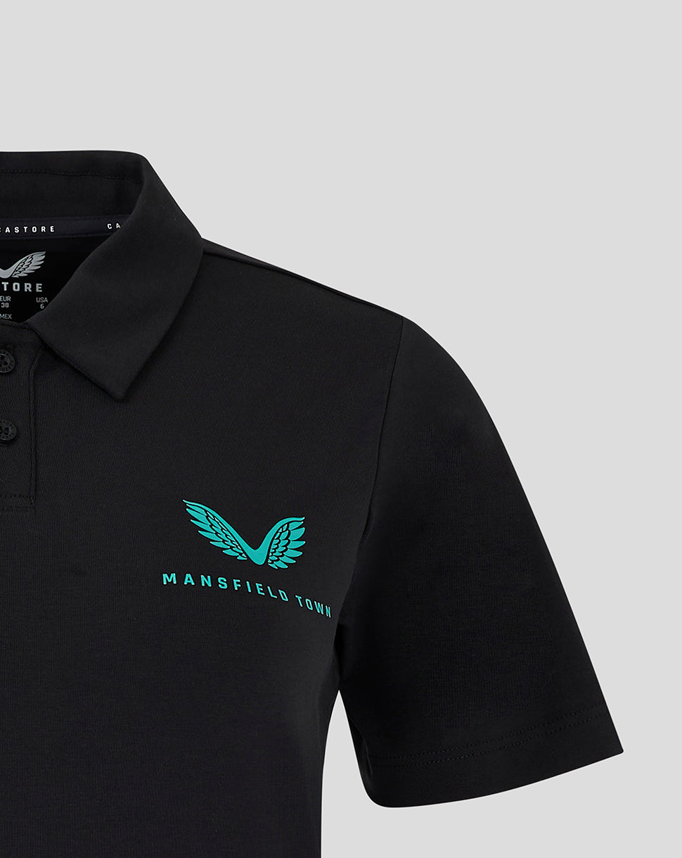 Close-up of teal wing logo and Mansfield Town text on the left chest of the polo