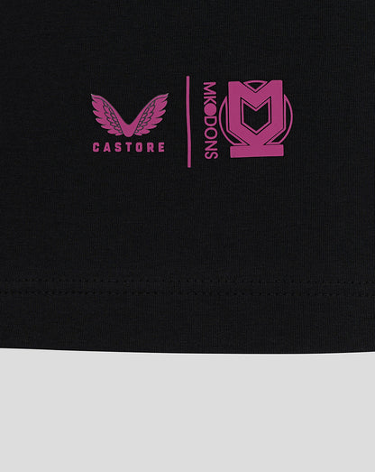 Black Mk Dons travel T shirt close up of chest with pink winged logo and Castore branding