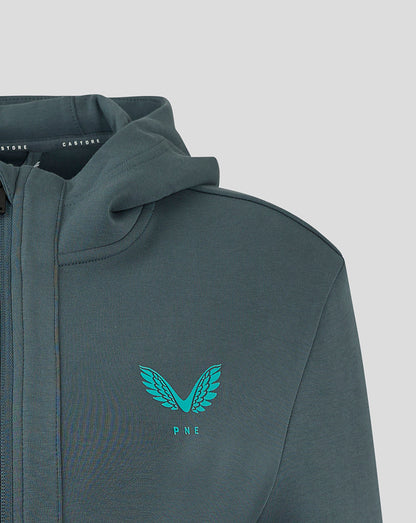 Cuff detail showing teal Castore logo and PNE crest on the sleeve