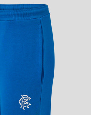 Close-up of blue Rangers FC Core Joggers showing elasticated waistband with drawcord and crest on left thigh