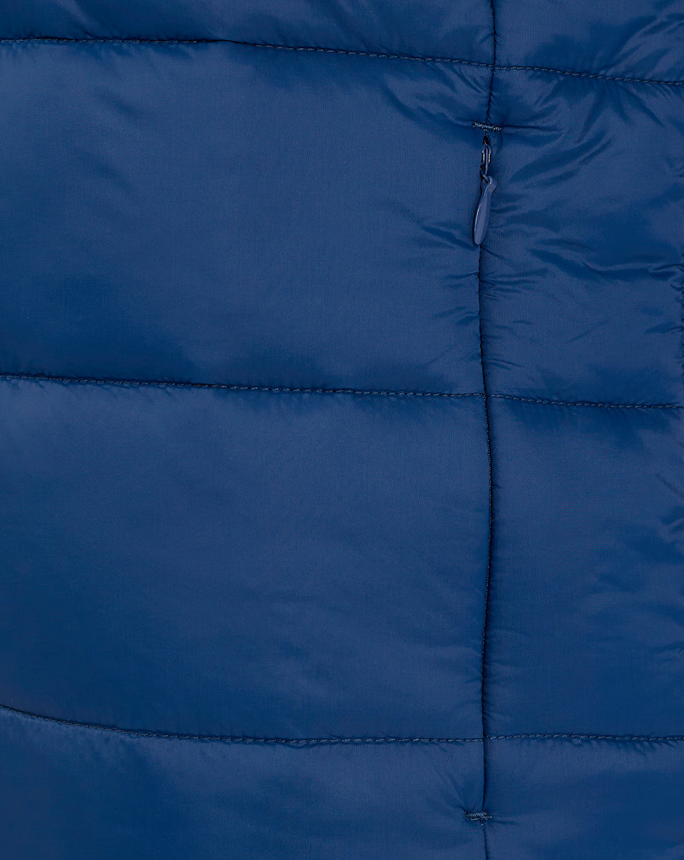 Close up of navy puffer jacket front showing vertical zipper and stitched panels