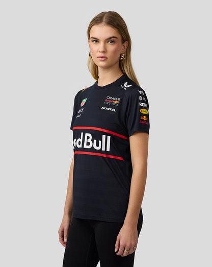 Front view of a woman wearing navy Set Up T Shirt with a large Red Bull logo across the chest.