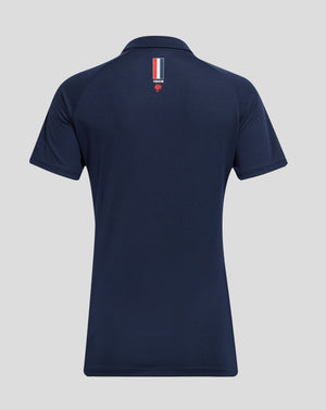 Back view of navy Sydney Roosters polo with a small vertical tri color badge and a red rooster emblem.