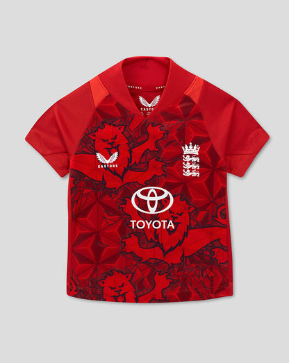 Red England T20 infant cricket shirt featuring a bold lion motif and Toyota sponsorship on a geometric pattern