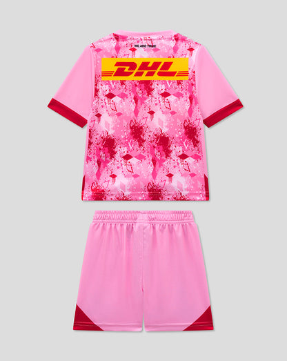 Back view of Harlequins Infant Away Kit in pink splatter print with matching shorts