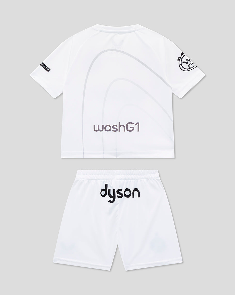 Back view of Bath Rugby infant away kit white shirt with subtle grey arc design and matching shorts with Dyson branding