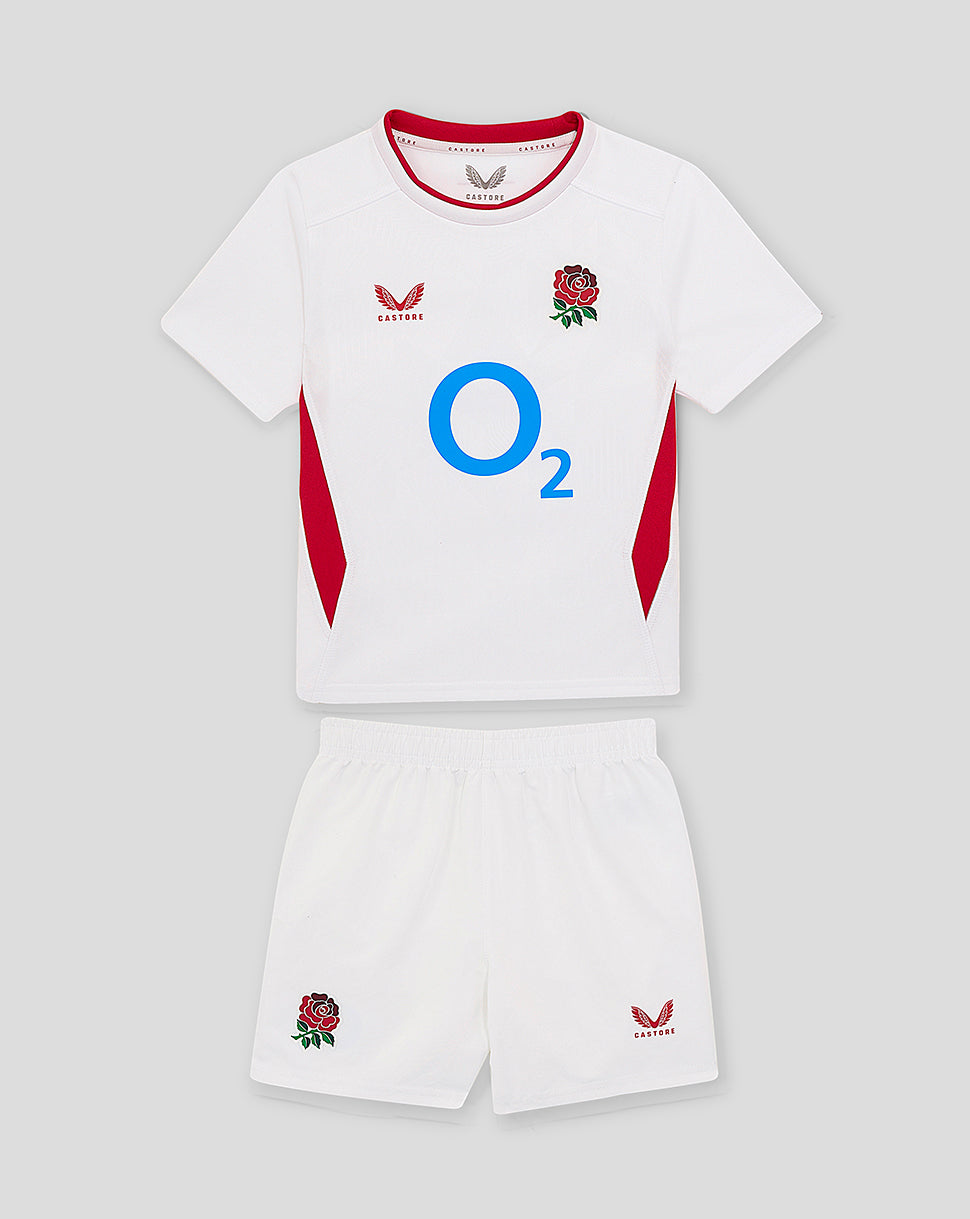 Infant white England Rugby 25/26 short sleeve home kit with rose crest and O2 logo, plus matching shorts.