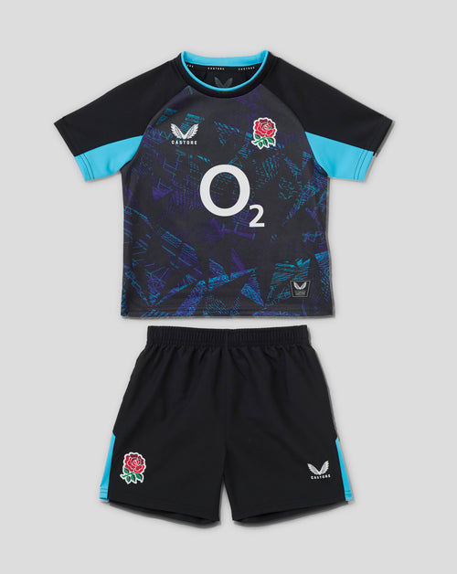 Infant England Rugby short sleeve alternate kit laid out with a navy shirt turquoise trim, rose crest and Castore logos, plus matching shorts and socks