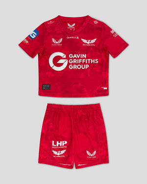 Scarlets Infant home kit in red featuring shirt and shorts with sponsor logos