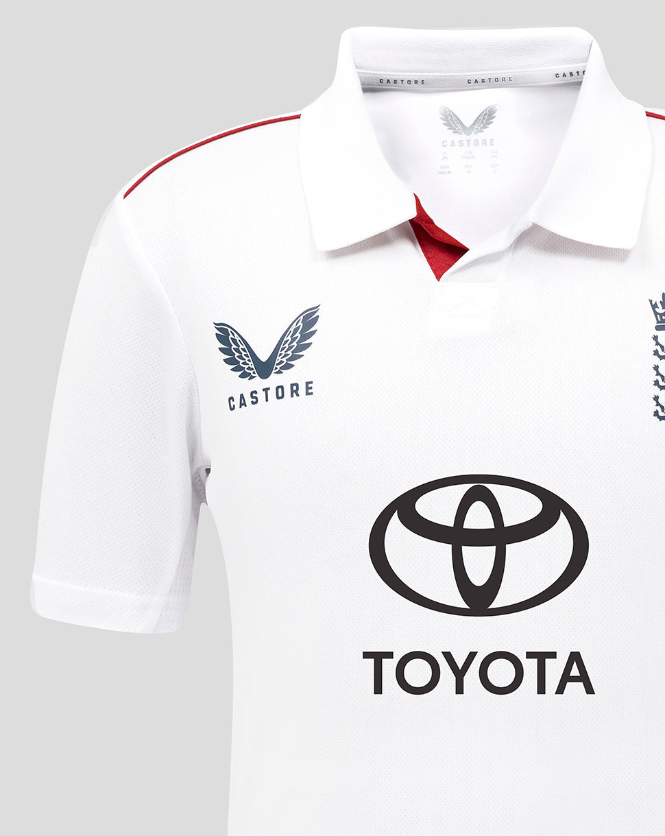 Close up of white England cricket shirt featuring Castore branding on the chest with the Toyota logo on the front.