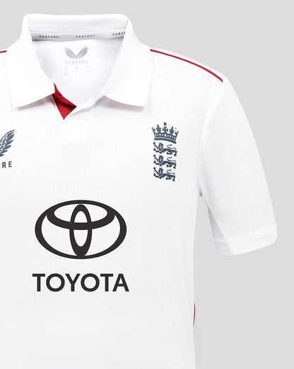 White junior England cricket shirt with Toyota sponsor logo and crest on chest.