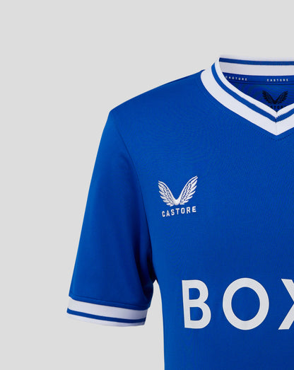 Collar close up of the blue Rangers shirt showing Castore label inside the neck and white trim