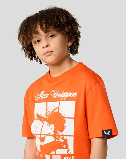 Front view of a junior orange Oracle Red Bull Racing Puzzle T Shirt featuring a large Max Verstappen graphic