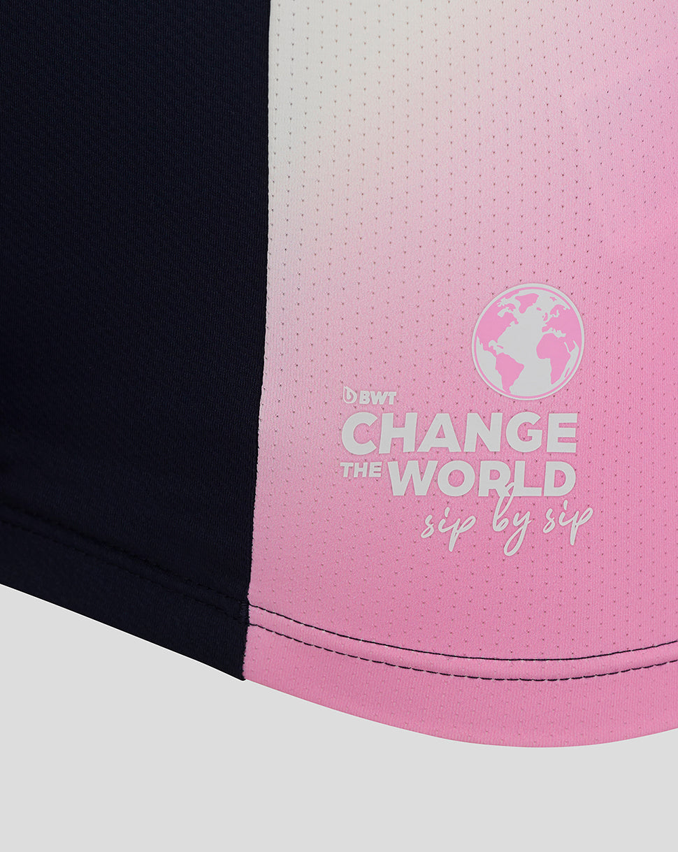 Pink gradient panel on the BWT Alpine jersey featuring Change the World globe graphic