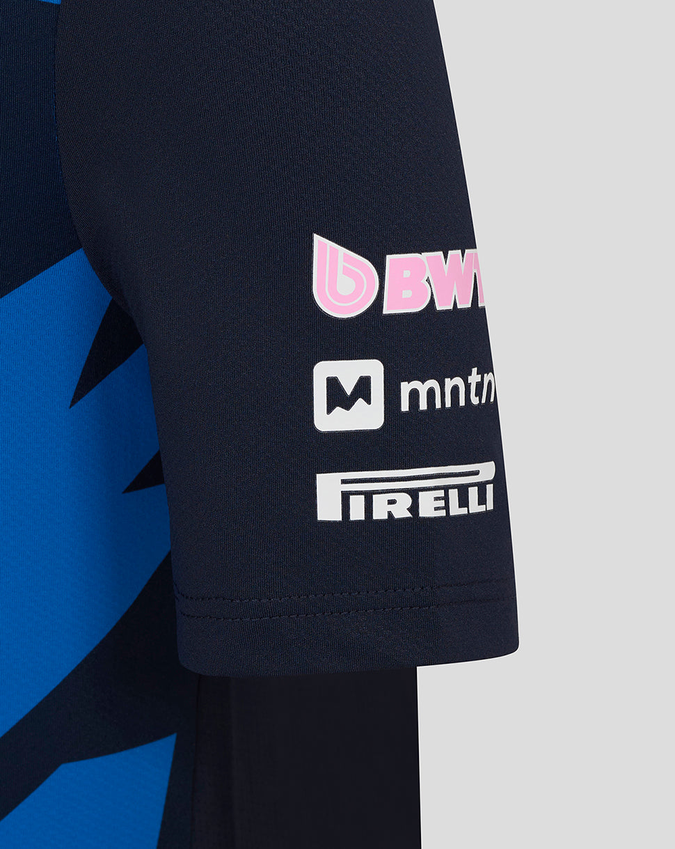 Close-up of navy junior Alpine driver jersey sleeve with BWT logo and Pirelli branding