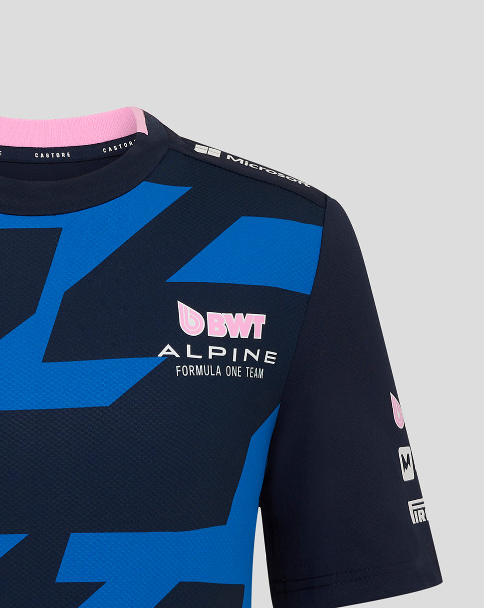 Shoulder close-up of navy Alpine jersey showing Microsoft branding and blue geometric pattern.