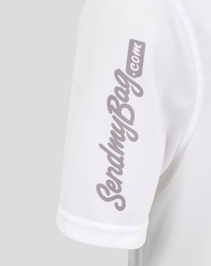 Close up of white Ulster junior home shirt sleeve with light gray script logo along the arm