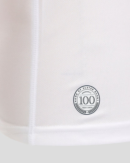 Lower portion of the white Ulster Home shirt showing a circular 100 year badge near the hem