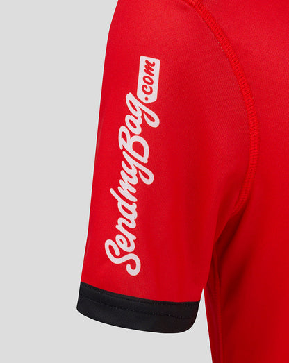 Close-up of red sleeve showing white script branding on the Ulster away rugby shirt