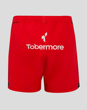 Back view of red Ulster Junior 24/25 Away Shorts with large Tobermore branding across the seat