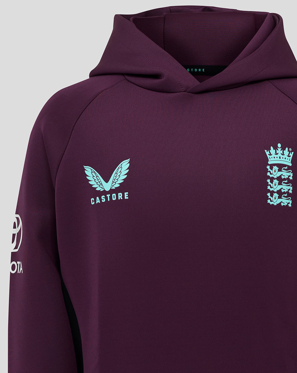 Chest area of the purple junior hoody with turquoise Castore logo and England crest.