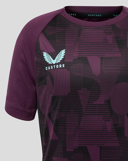 England cricket training junior short sleeve tee in deep purple with geometric print and light blue Castore logo and team crest