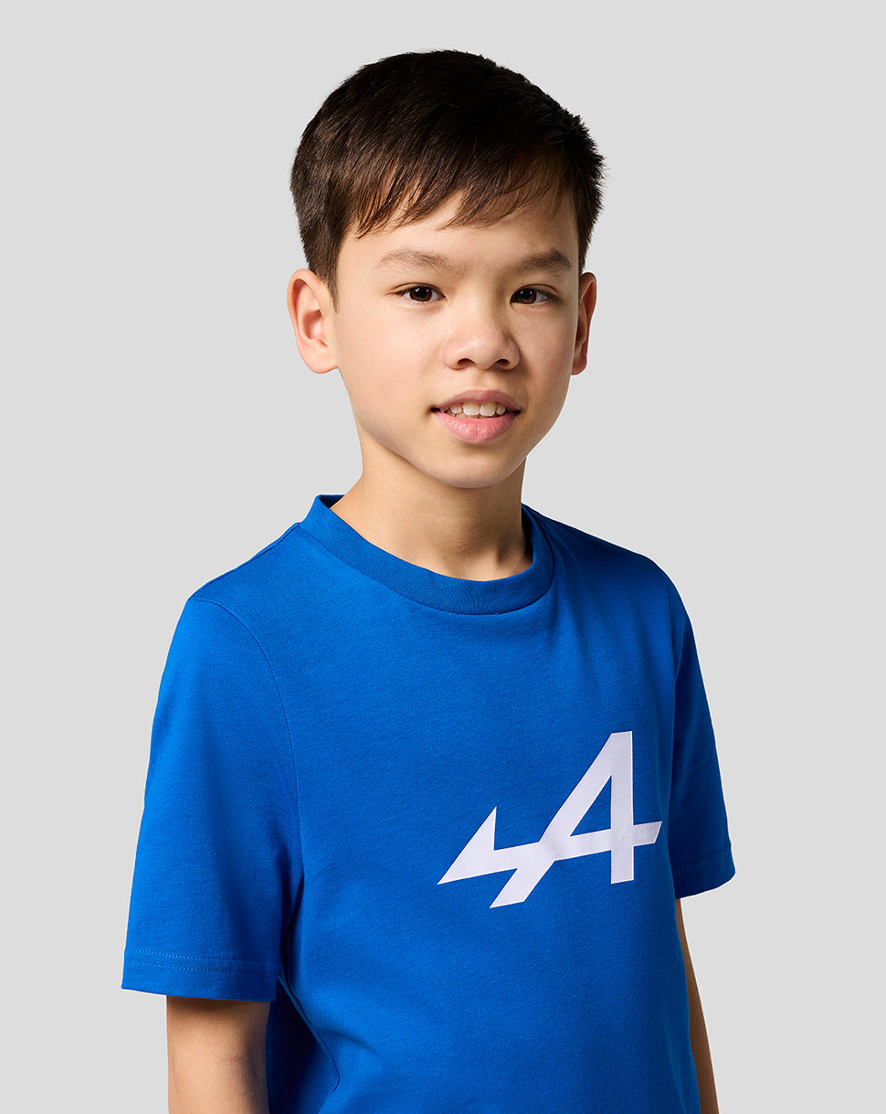 Lapis blue Alpine Juniors Core Essentials T-Shirt shown in close up with a large white Alpine logo.