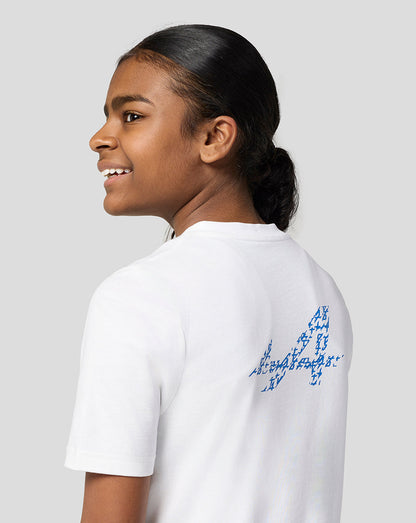 Back view of white Alpine Juniors Graphic T-Shirt with a large blue graphic across the back.