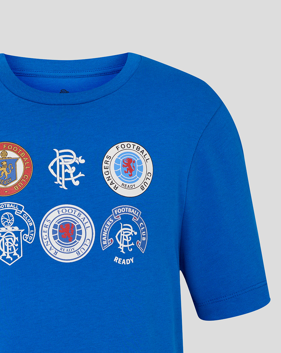 Close up of the blue Rangers Junior Badge Tee showing several circular club badges on the chest.
