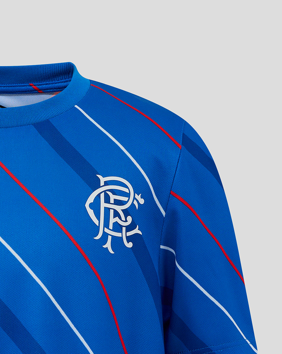 Close-up of the blue Rangers jersey showing the chest crest and Umbro emblem with diagonal stripes