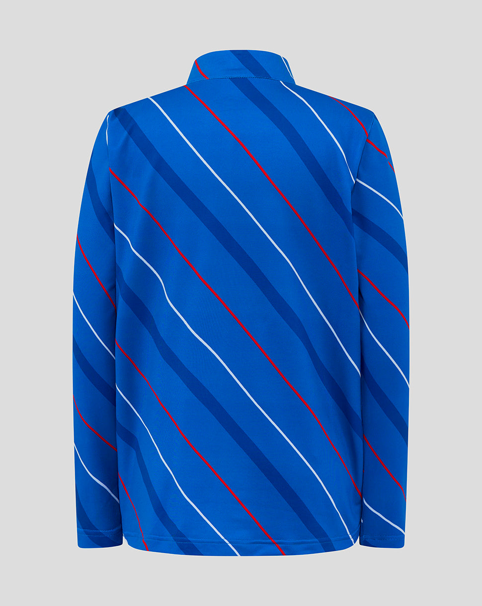 Back view of a blue Rangers junior home quarter zip jacket with diagonal red and white stripes