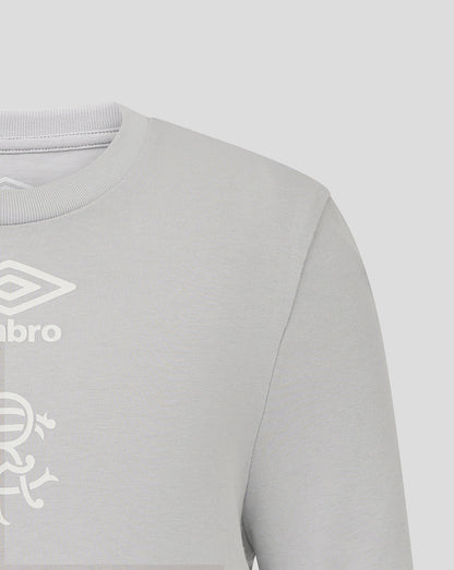 Light grey Rangers Junior 25/26 Presentation Logo Tee front close up with white Umbro logo and club crest